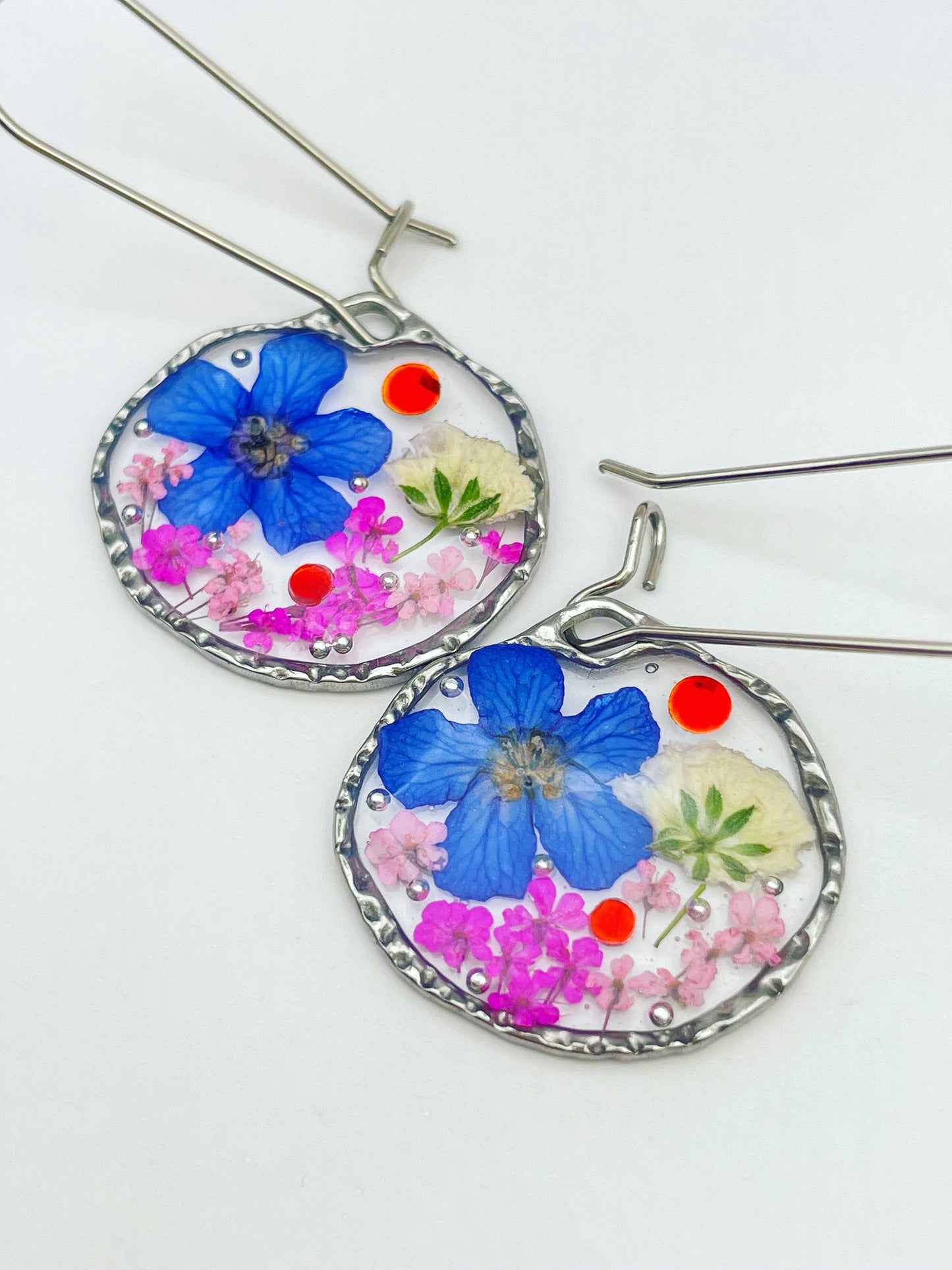 Dangle earrings with blue, white and pink gypsophila flowers