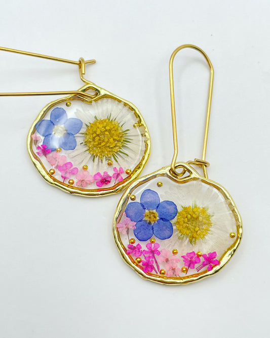 Earrings with daisy and forget me not flowers