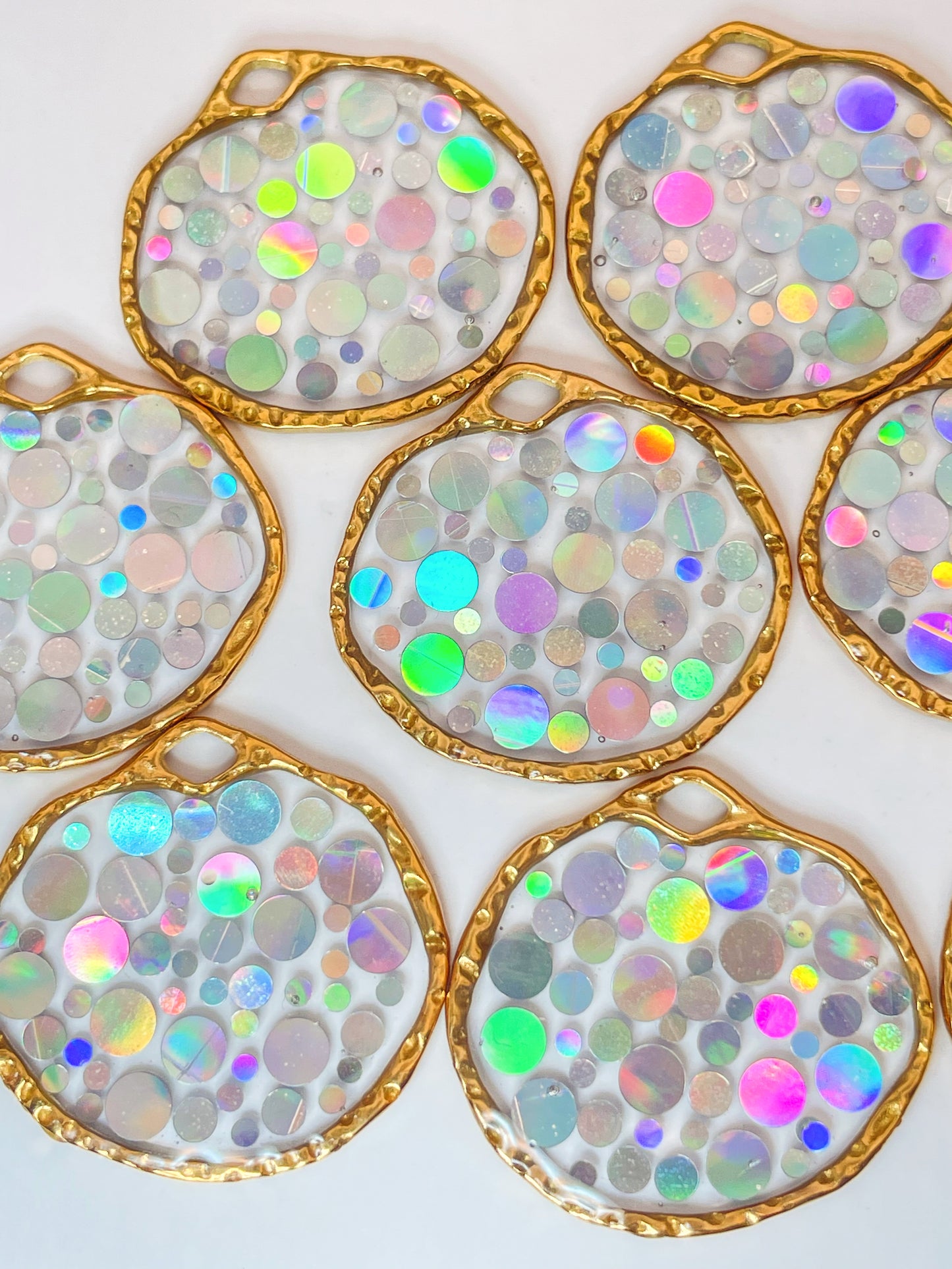 Small disco earrings with holographic silver sparkles