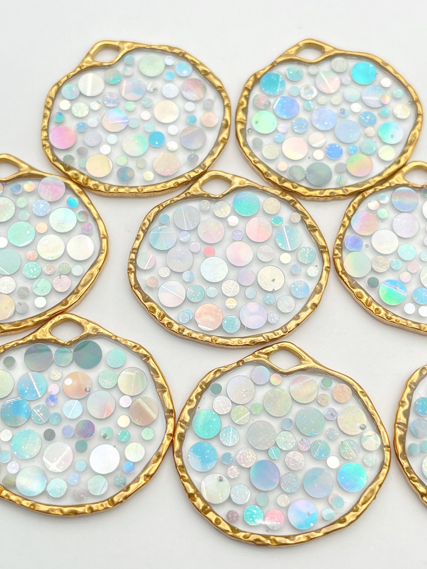 Small disco earrings with holographic silver sparkles