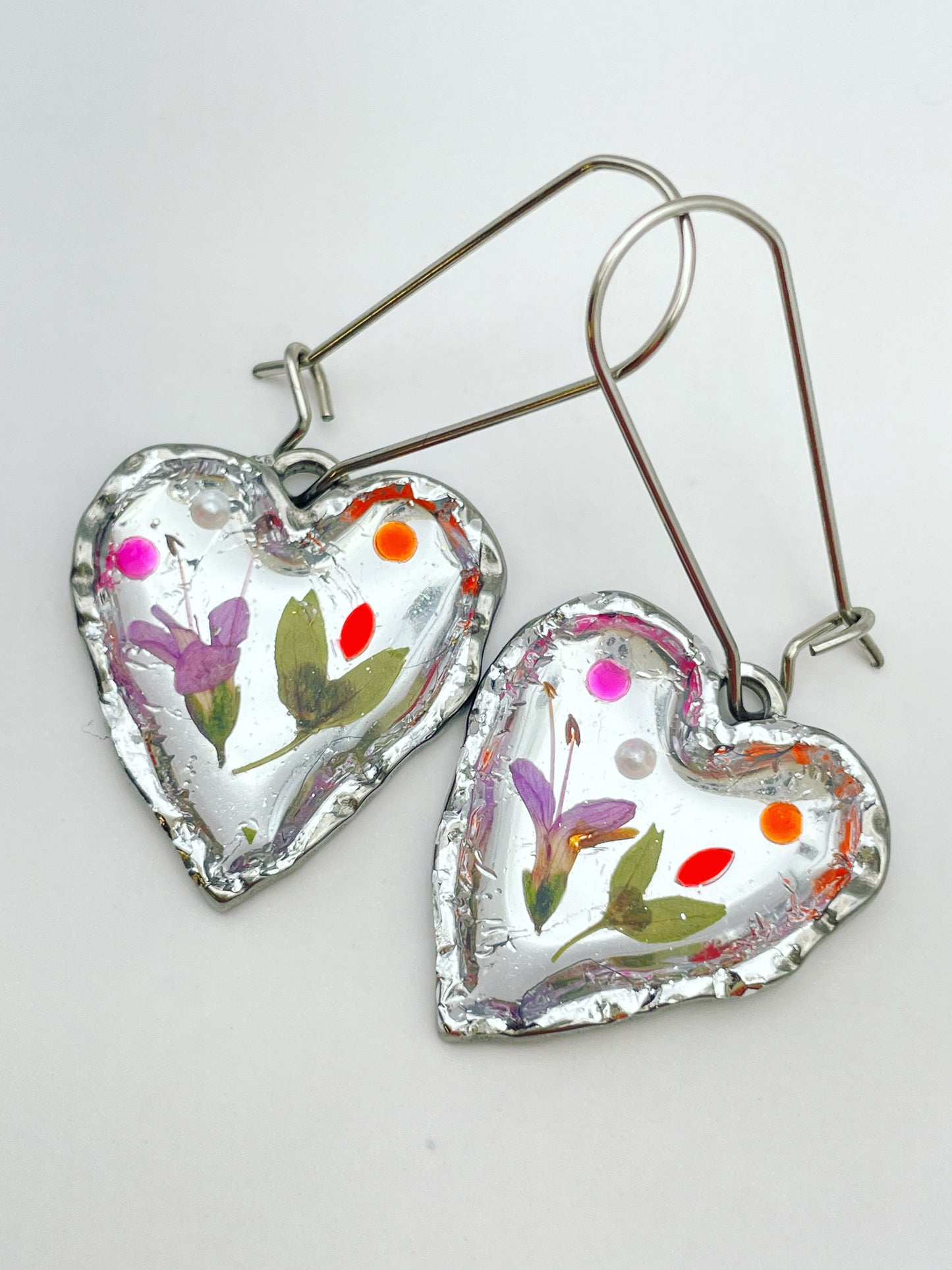 Silver heart earrings with pink flowers