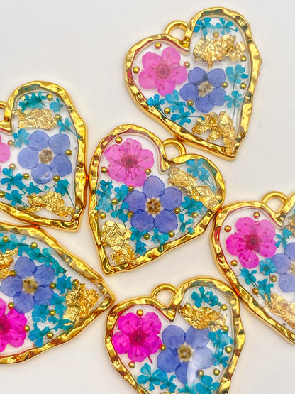 Heart necklace with forget-me-not and pink flowers