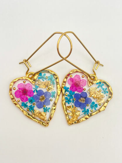 Heart dangle earrings with forget-me-not and pink flowers