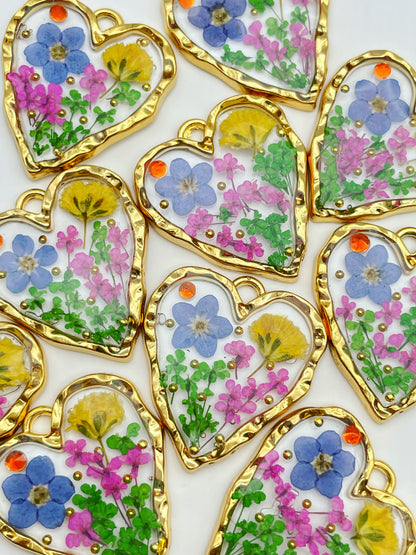 Heart dangle earrings with forget-me-not in gold or silver