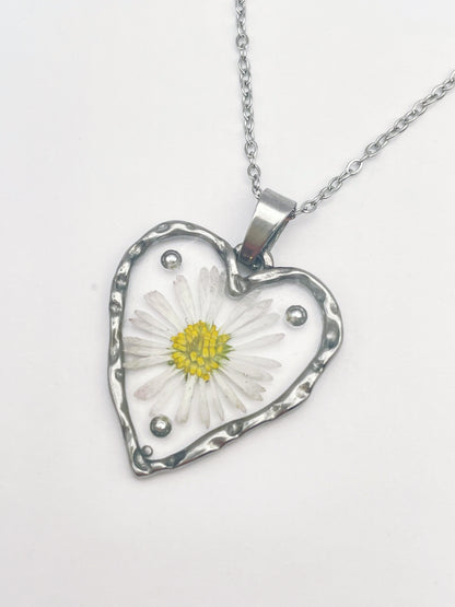 Heart pendant necklace with daisies and silver beads