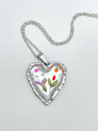 Silver heart necklace with pink flowers