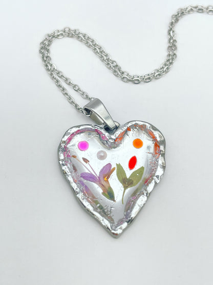 Silver heart necklace with pink flowers