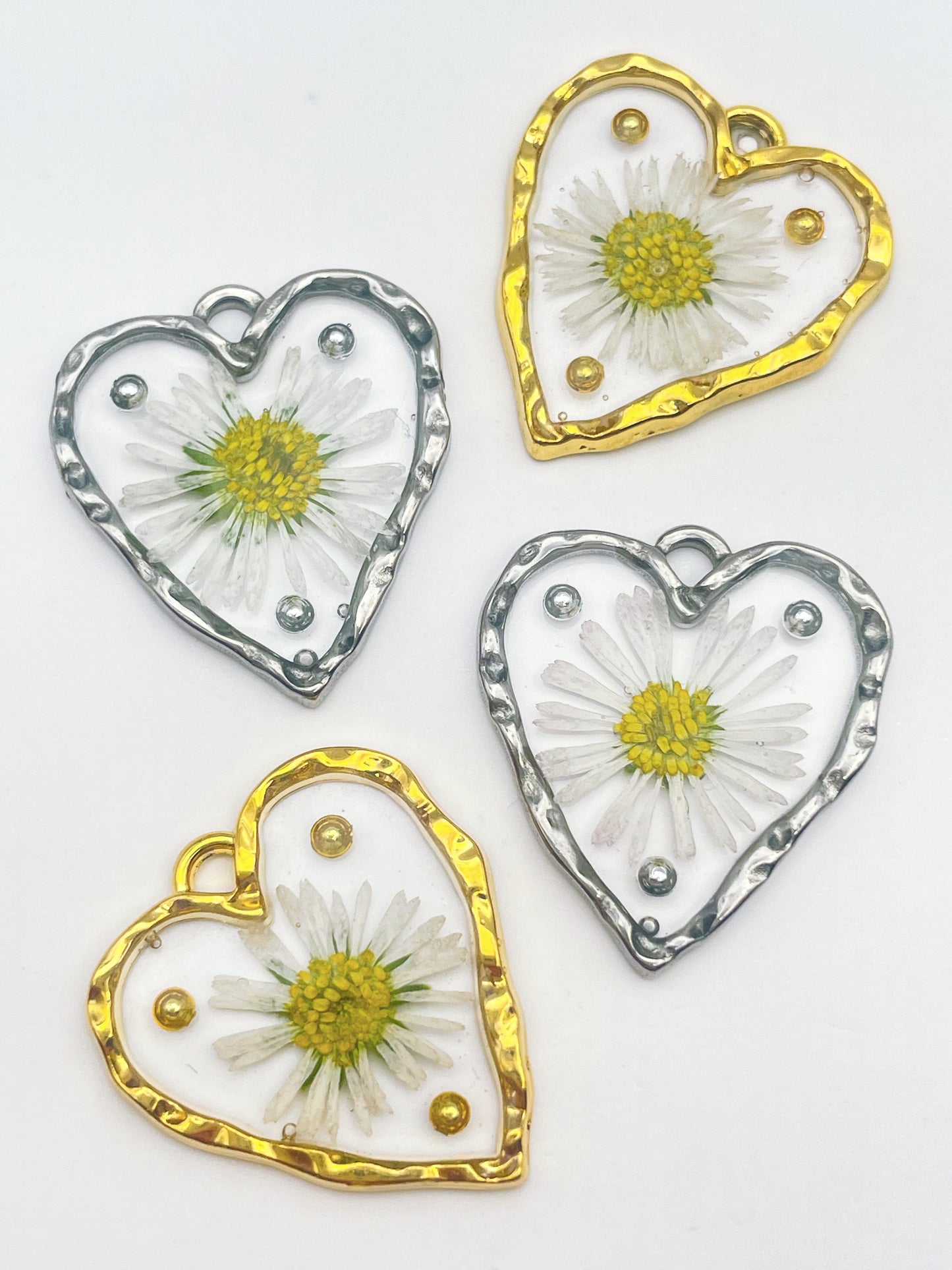 Heart dangle earrings with daisy flowers and gold beads