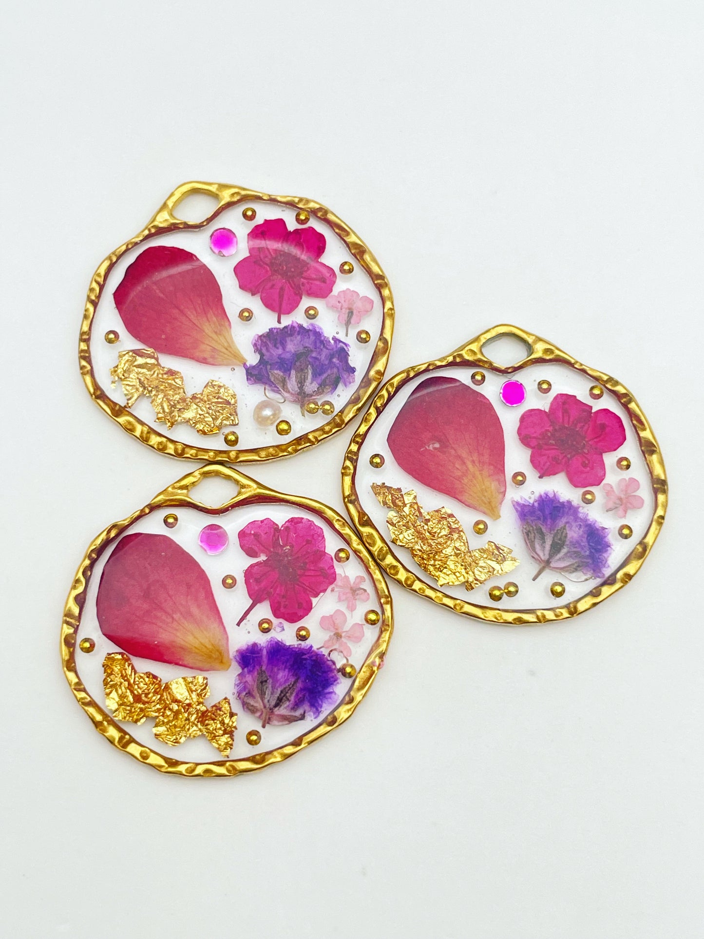 Dangle earrings with rose petals and gold leaf