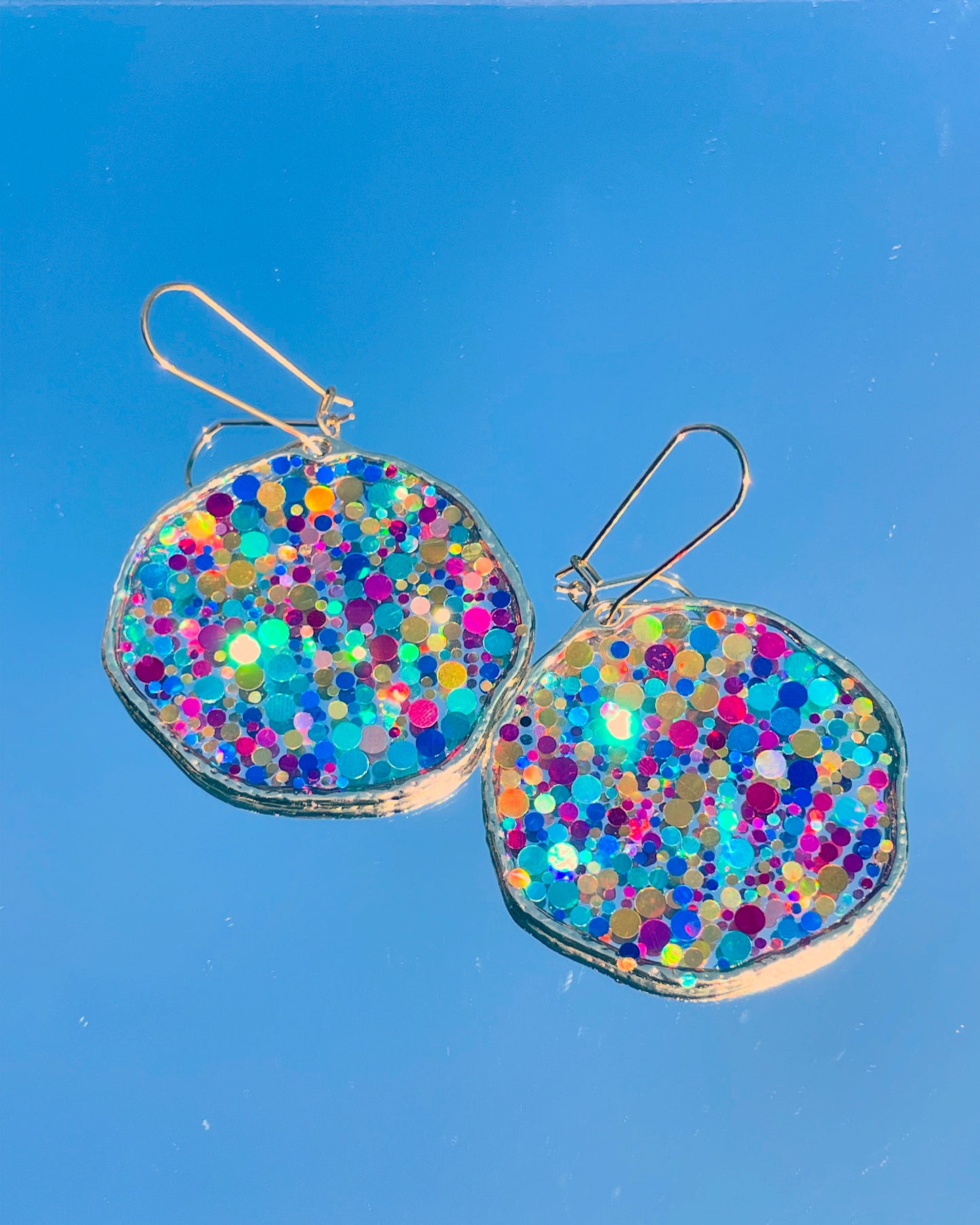 Large disco earrings with colourful sparkles