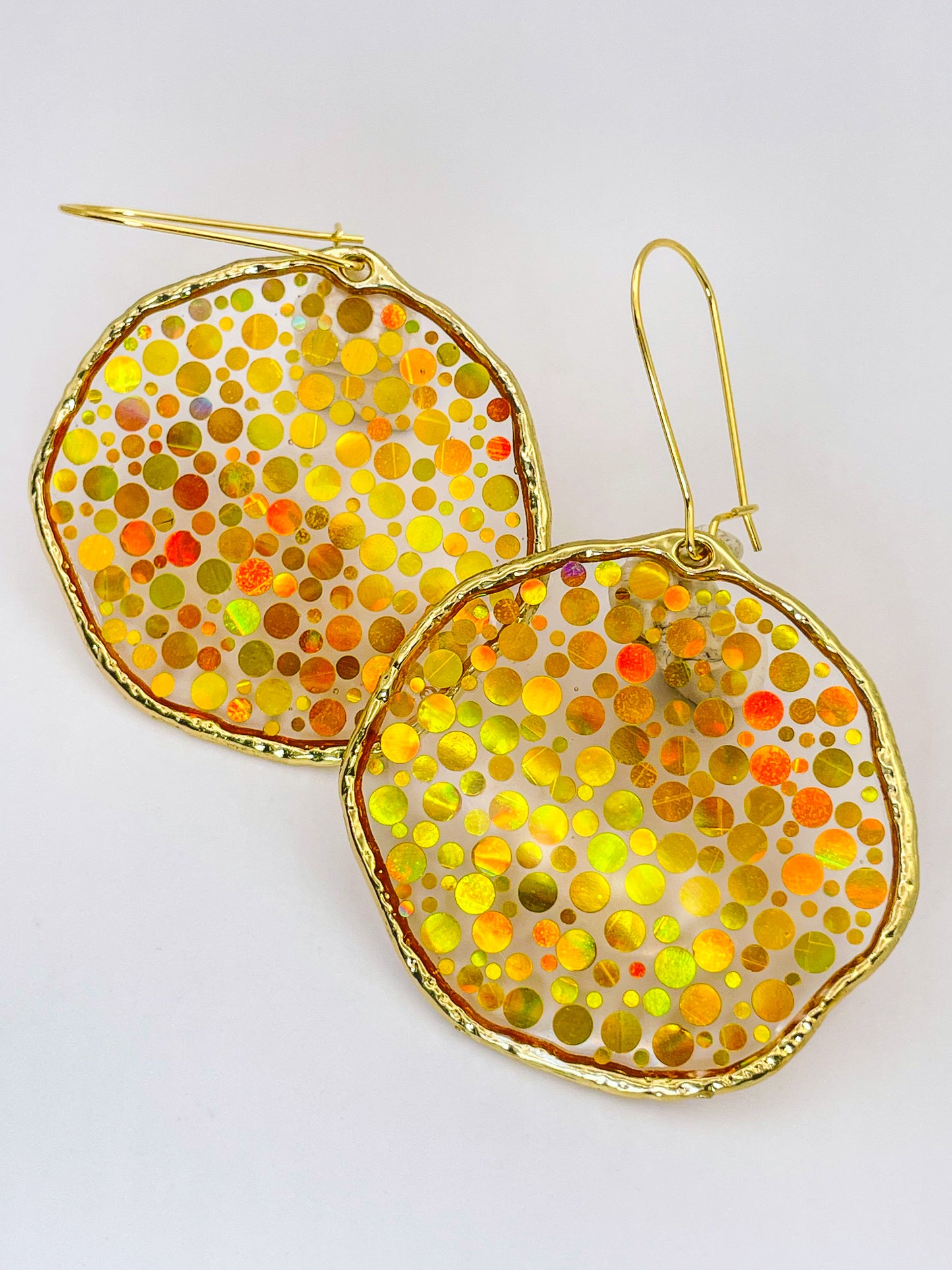 Large statement disco earrings with gold sequins