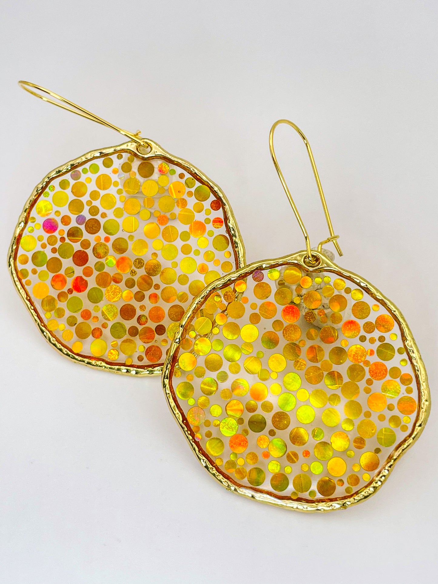 Large statement disco earrings with gold sequins