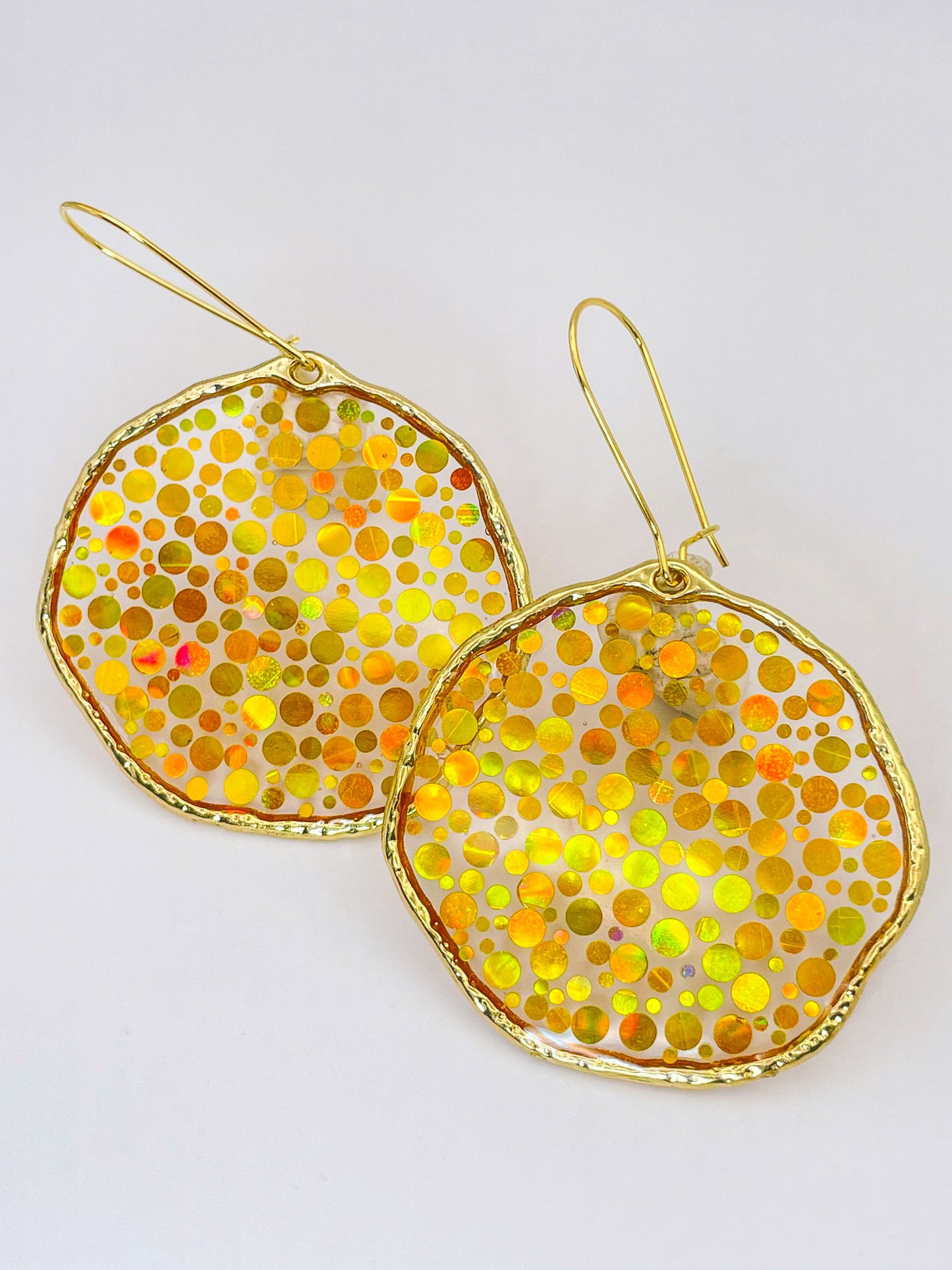 Large statement disco earrings with gold sequins