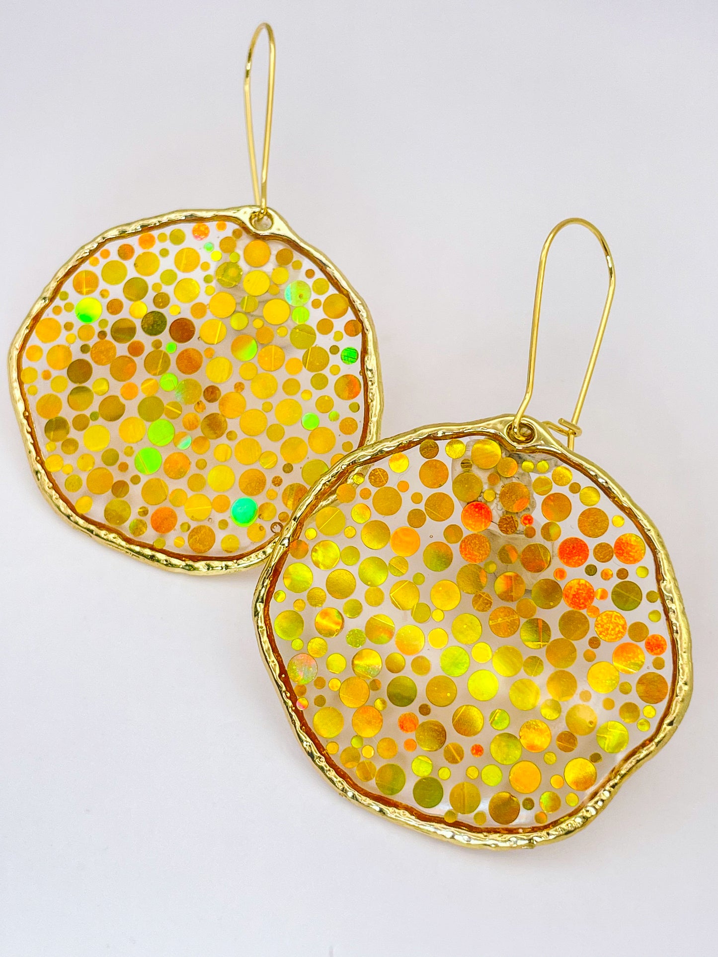 Large statement disco earrings with gold sequins