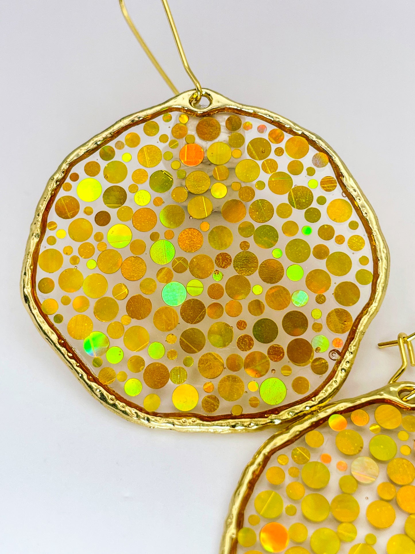 Large statement disco earrings with gold sequins