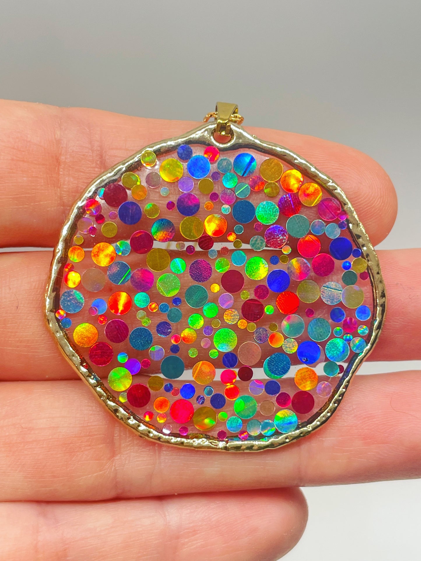 Large disco earrings with colourful sparkles