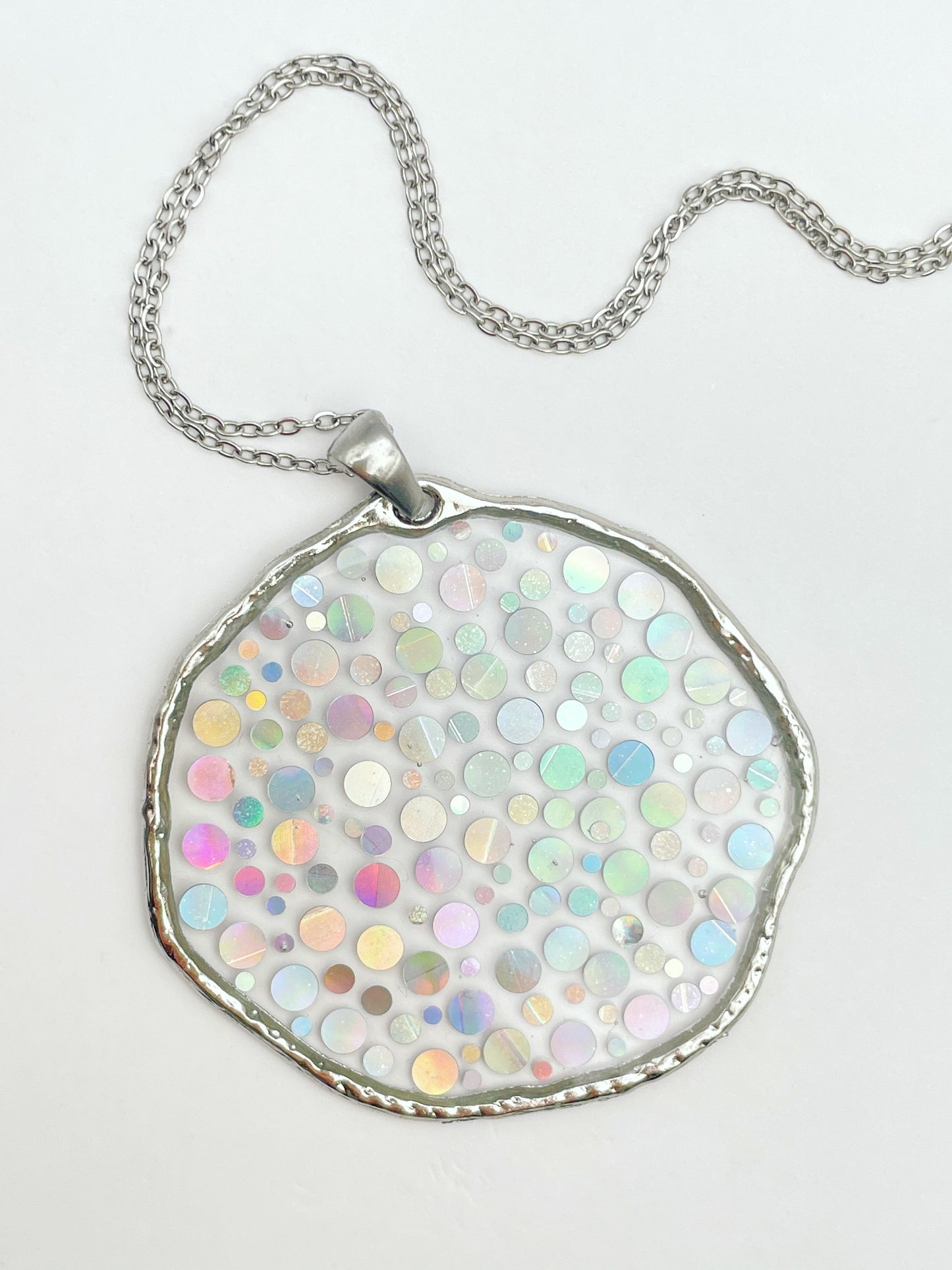 Large disco earrings with holographic silver sparkles