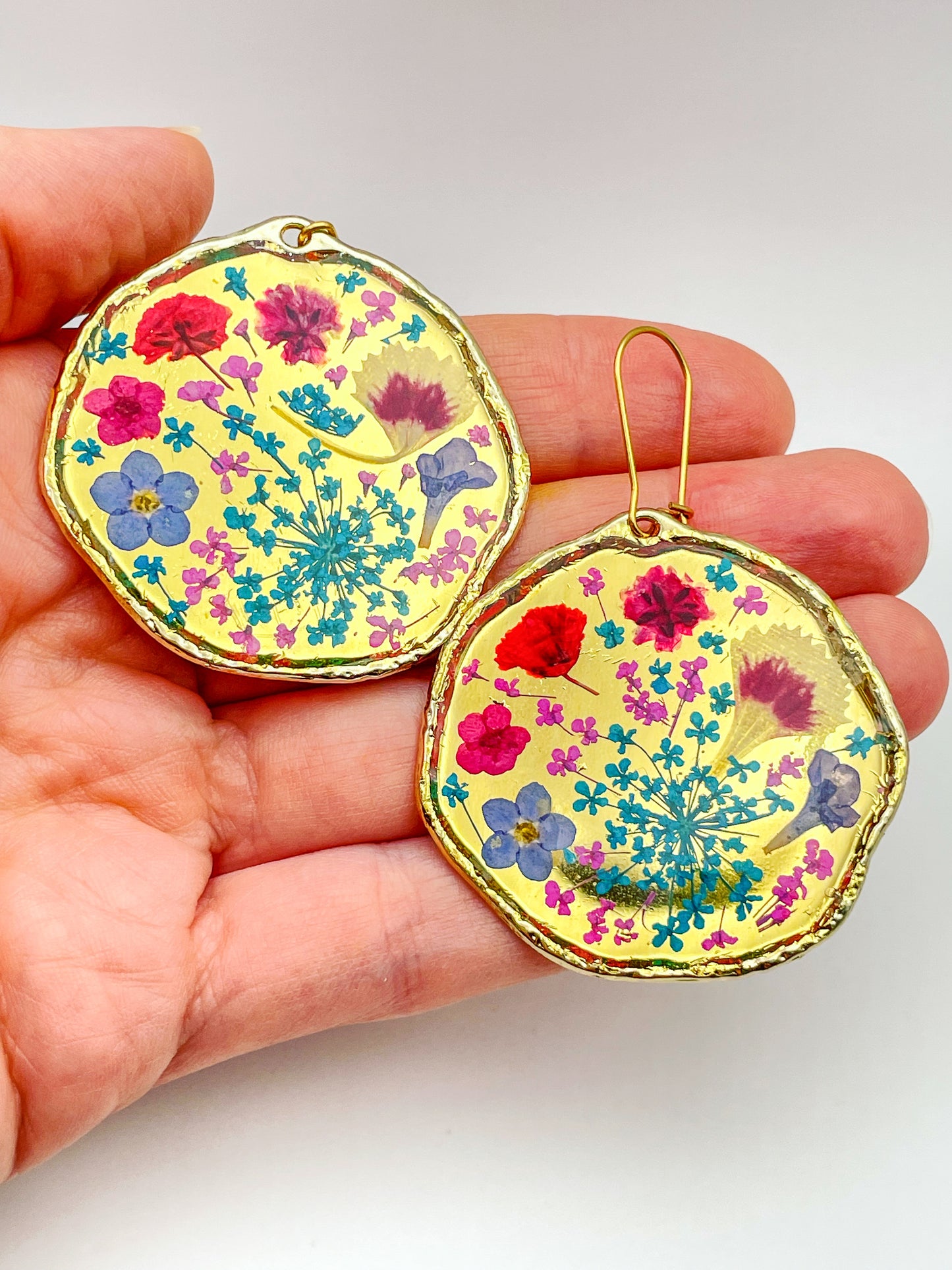 Large dangle earrings with real flowers and gold leaf