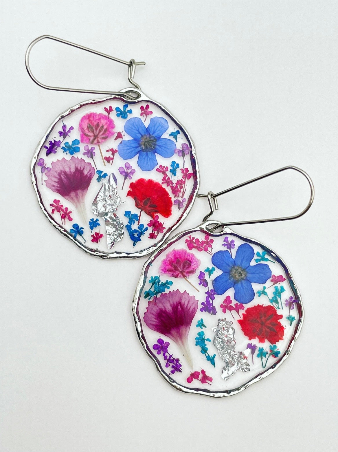 Statement earrings with colourful flowers in silver