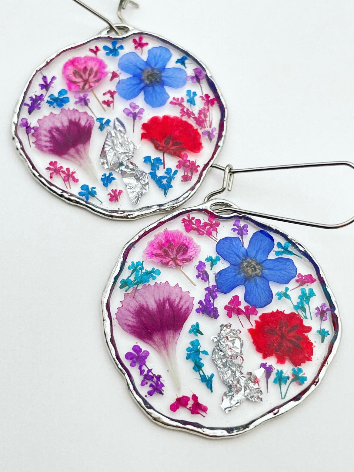 Statement earrings with colourful flowers in silver