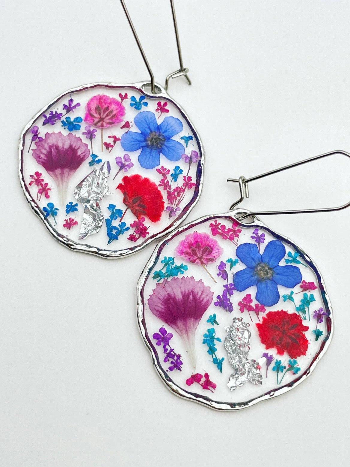 Statement earrings with colourful flowers in silver