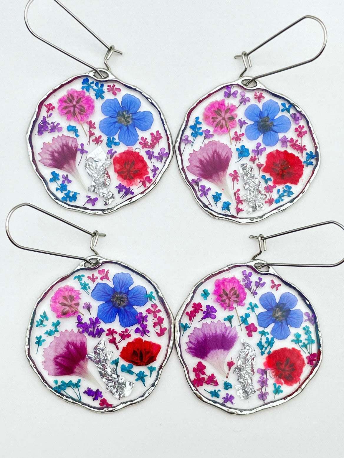 Statement earrings with colourful flowers in silver