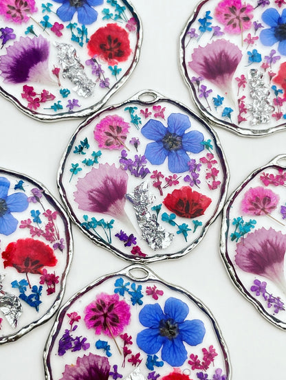 Statement earrings with colourful flowers in silver