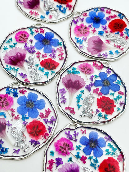 Statement earrings with colourful flowers in silver