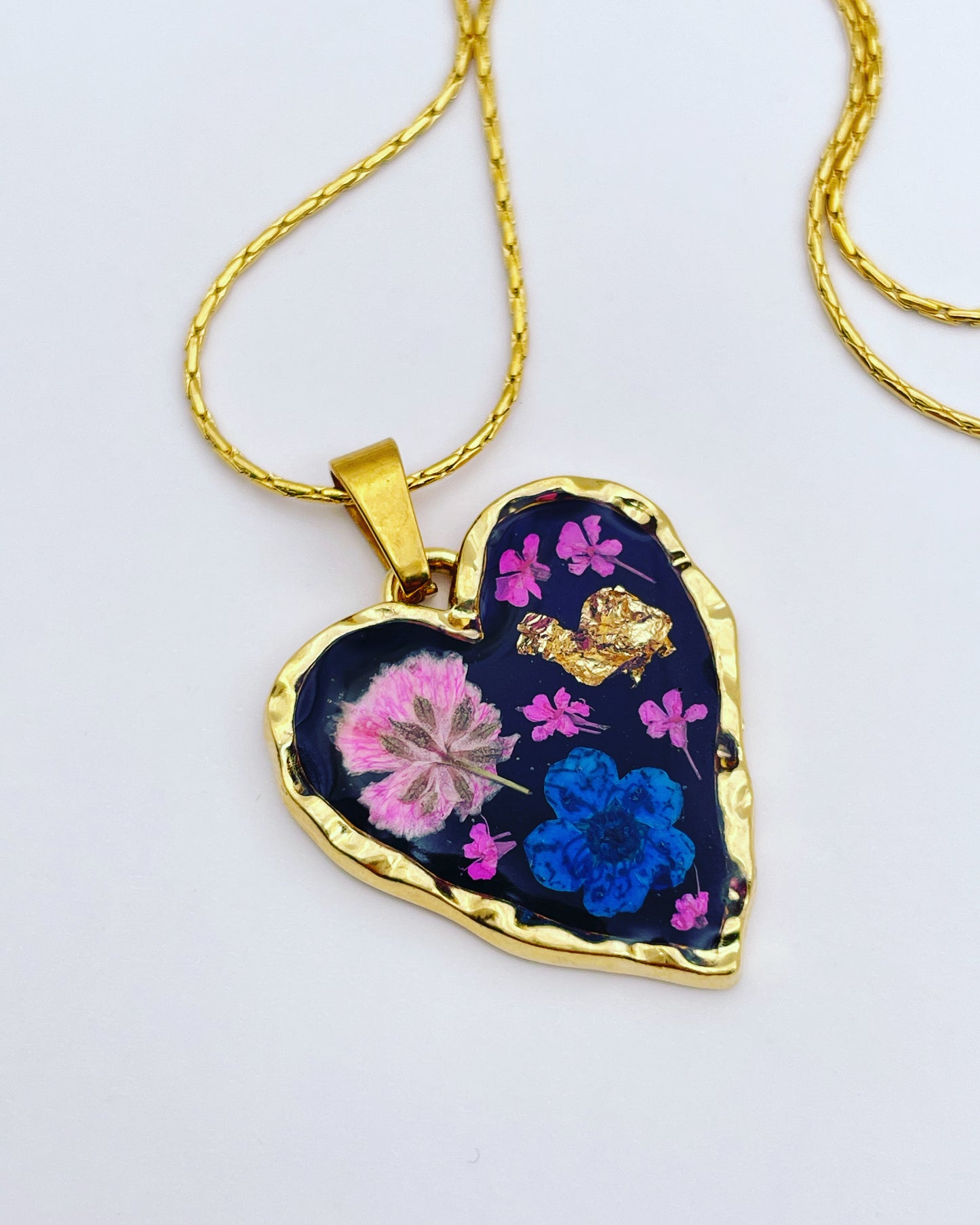 Black heart pendant necklace with real flowers and gold leaf