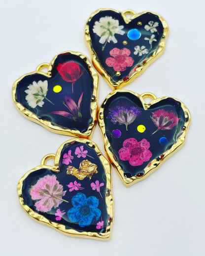 Black heart pendant necklace with real flowers and gold leaf