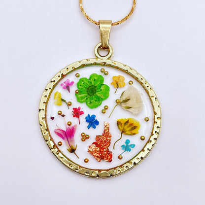 Statement earrings with colourful flowers in gold