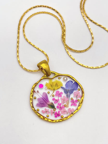 Pendant necklace with lavender and pink flowers