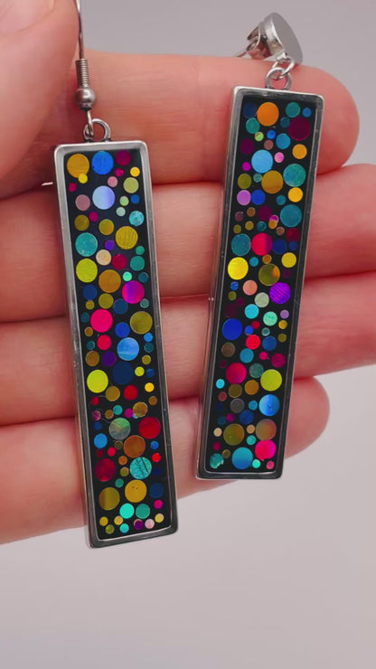 Long disco earrings with colourful sparkles in black lacquer